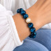 12 mm Blue Tiger’s Eye Bracelet with Faux Pearl and Gold-Tone Accents 12 mm Blue Tiger’s Eye Bracelet with Faux Pearl and Gold-Tone Accents