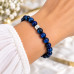 8 mm Dark Blue Tiger’s Eye Bracelet with Silver-Tone Stainless Steel Charm 8 mm Dark Blue Tiger’s Eye Bracelet with Silver-Tone Stainless Steel Charm