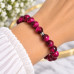 10 mm Pink Tiger’s Eye Bracelet with Silver-Tone Stainless Steel Spacer 10 mm Pink Tiger’s Eye Bracelet with Silver-Tone Stainless Steel Spacer