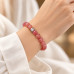 8 mm Faceted Strawberry Quartz Bracelet with Stainless Steel Charm 8 mm Faceted Strawberry Quartz Bracelet with Stainless Steel Charm