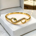 Gold Stainless Steel Snake Design Bangle Bracelet – Green Zirconia Gold Stainless Steel Snake Design Bangle Bracelet – Green Zirconia