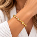 Gold-Tone Stainless Steel Flower Bangle Bracelet Gold-Tone Stainless Steel Flower Bangle Bracelet
