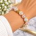 12 mm Majorica Style Pearl Bracelet with Gold-Tone Spacer Charm 12 mm Majorica Style Pearl Bracelet with Gold-Tone Spacer Charm