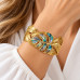Gold-Tone Stainless Steel Bangle with Abalone Shell Leaf – Adjustable