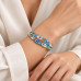Silver-Tone Stainless Steel Bangle with Blue Enamel Teardrop Design – Elegant Statement Bracelet Silver-Tone Stainless Steel Bangle with Blue Enamel Teardrop Design – Elegant Statement Bracelet