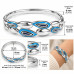 Silver-Tone Stainless Steel Bangle with Blue Enamel Teardrop Design – Elegant Statement Bracelet Silver-Tone Stainless Steel Bangle with Blue Enamel Teardrop Design – Elegant Statement Bracelet