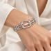 Silver-Tone Stainless Steel Belt Buckle Bangle – Elegant Woven Design Silver-Tone Stainless Steel Belt Buckle Bangle – Elegant Woven Design
